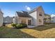 House with backyard patio and some landscaping at 4260 Wesley Hall Dr, Decatur, GA 30035