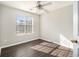 Well-lit bedroom featuring a ceiling fan and wood-look floors at 4260 Wesley Hall Dr, Decatur, GA 30035