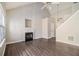 Living room with hardwood floors, fireplace, and high ceilings at 4260 Wesley Hall Dr, Decatur, GA 30035