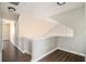 Upstairs hallway with view of a bedroom and staircase at 4260 Wesley Hall Dr, Decatur, GA 30035