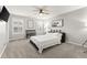 Spacious bedroom with a large bed and neutral decor at 4835 Sugar Maple Ln, Cumming, GA 30040