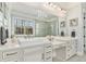 Elegant bathroom with double vanity and large shower at 7519 Waterview Cv, Douglasville, GA 30135
