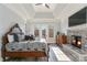 Spacious main bedroom with fireplace and large windows at 7519 Waterview Cv, Douglasville, GA 30135