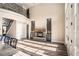 Spacious great room with hardwood floors, fireplace, and access to backyard at 7519 Waterview Cv, Douglasville, GA 30135