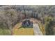 Two-story house with stone exterior and large driveway at 7519 Waterview Cv, Douglasville, GA 30135