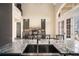 Kitchen boasts a large island, stainless steel sink, and expansive countertops at 7519 Waterview Cv, Douglasville, GA 30135