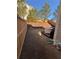 Backyard with hot tub, wooden fence, and sloped grass at 3109 Baylor Cir, Mcdonough, GA 30253