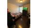 Bedroom with striped bedding, TV, and built-in desk area at 3109 Baylor Cir, Mcdonough, GA 30253