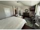 Spacious bedroom with large bed, home office space, and ample closet space at 3109 Baylor Cir, Mcdonough, GA 30253