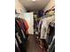 Walk-in closet with ample hanging space and shelving at 3109 Baylor Cir, Mcdonough, GA 30253