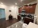 Spacious kitchen with stainless steel appliances and granite countertops at 3109 Baylor Cir, Mcdonough, GA 30253