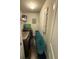 Bright laundry room with washer, dryer, and ample shelving at 3109 Baylor Cir, Mcdonough, GA 30253