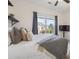 Comfortable bedroom with a large window and a cozy atmosphere at 4204 Mastic Pointe # 24, Acworth, GA 30101