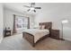 Main bedroom with a king-size bed and en-suite bathroom at 4204 Mastic Pointe # 24, Acworth, GA 30101