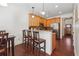 Kitchen with breakfast bar, stainless steel appliances, and hardwood floors at 4204 Mastic Pointe # 24, Acworth, GA 30101