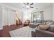 Bright and airy living area with hardwood floors and access to the staircase at 4204 Mastic Pointe # 24, Acworth, GA 30101