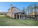 Brick home with multi-level deck and landscaped yard at 5195 Hamby Rd, Acworth, GA 30102