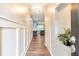 Bright entryway with wood-look floors and board and batten detail at 1106 Firethorne Pass, Cumming, GA 30040