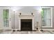 Gas fireplace with white mantel in living room at 3960 Riverlook Pkwy # 101, Marietta, GA 30067