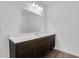 Bathroom featuring a spacious vanity with modern fixtures and ample counter space at 4770 Marco Ln, Cumming, GA 30028