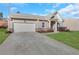 Charming single-story home showcasing a wide driveway, attached garage, and well-manicured lawn at 4770 Marco Ln, Cumming, GA 30028