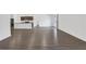 Open floor plan has an eat-in kitchen and modern hard flooring at 4770 Marco Ln, Cumming, GA 30028