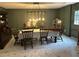 Formal dining room with dark wood table and chairs at 2051 Irwin Bridge Nw Rd, Conyers, GA 30012