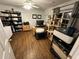 Home office features wood floors and built-in shelving at 2051 Irwin Bridge Nw Rd, Conyers, GA 30012