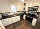 Modern kitchen with stainless steel appliances at 2051 Irwin Bridge Nw Rd, Conyers, GA 30012