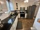 Stainless steel appliances and granite countertops at 2051 Irwin Bridge Nw Rd, Conyers, GA 30012