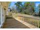 Wooden deck overlooks the backyard and trees at 52 Jennifer Ln, Carrollton, GA 30116