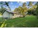 Back exterior view of house, deck, and fenced yard at 52 Jennifer Ln, Carrollton, GA 30116