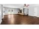 Open living area with hardwood floors, fireplace and access to kitchen at 52 Jennifer Ln, Carrollton, GA 30116