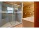 Modern bathroom with a large walk-in shower, granite countertop vanity, and gray tile at 5520 Hearn Rd, Ellenwood, GA 30294