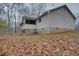 Side view of house showing screened porch at 5520 Hearn Rd, Ellenwood, GA 30294