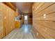 View of kitchen entryway with wood-paneled walls at 5520 Hearn Rd, Ellenwood, GA 30294