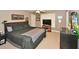 King-size bedroom with ample space and a ceiling fan at 6425 Riley Manor Way, Cumming, GA 30028