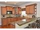 Well-appointed kitchen with granite countertops and ample cabinetry at 6425 Riley Manor Way, Cumming, GA 30028