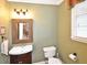 Convenient powder room with updated vanity and fixtures at 6425 Riley Manor Way, Cumming, GA 30028