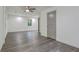 Bright bedroom with hardwood floors and a window at 8658 Knox Bridge Hwy, Canton, GA 30114