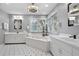 Spa-like bathroom with a large soaking tub and double vanities at 1013 Lenox Valley Ne Dr, Atlanta, GA 30324