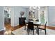 Bright dining room with hardwood floors and modern chandelier at 1013 Lenox Valley Ne Dr, Atlanta, GA 30324