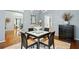 Elegant dining room featuring hardwood floors and modern light fixture at 1013 Lenox Valley Ne Dr, Atlanta, GA 30324