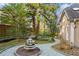 Landscaped garden with stone walkway and fountain at 1013 Lenox Valley Ne Dr, Atlanta, GA 30324