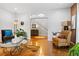 Living room with hardwood floors, comfortable seating, and views to the entryway at 1013 Lenox Valley Ne Dr, Atlanta, GA 30324