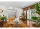 Living room with hardwood floors, comfortable seating, and views to the entryway at 1013 Lenox Valley Ne Dr, Atlanta, GA 30324