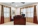 Home office with built-in desk and plenty of natural light at 1013 Lenox Valley Ne Dr, Atlanta, GA 30324