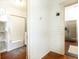 Bathroom with hardwood floors and access to kitchen at 1252 Mclendon Ne Ave, Atlanta, GA 30307