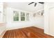 Bright bedroom with hardwood floors and large windows at 1252 Mclendon Ne Ave, Atlanta, GA 30307