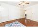 Bright bedroom with hardwood floors and ceiling fan at 1252 Mclendon Ne Ave, Atlanta, GA 30307